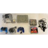 PlayStation 1 with  games including Die Hard, Tomb Raider and Worms and 4 controllers, including a