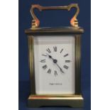 Brass carriage clock, the face marked Mappin & Webb, with key, appears to be working