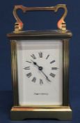 Brass carriage clock, the face marked Mappin & Webb, with key, appears to be working