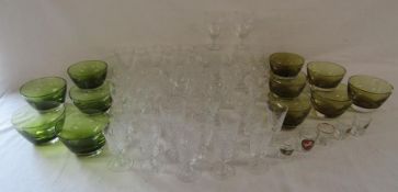 Green glass bowls, crystal and glass drinking glasses