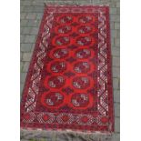 Red, blue and white Persian rug, L204cm x W102cm
