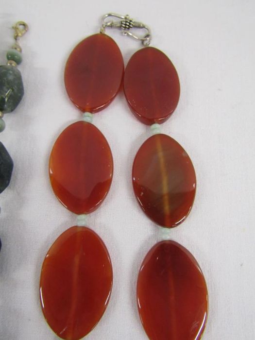 Selection of possibly semi-precious stone jewellery includes large carved pendant - Image 4 of 4