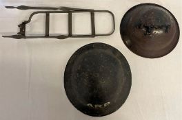 WWII cycle carrier dated 1945, WWII child's steel helmet and a WWII ARP helmet appears marked F&L 87