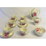 Royal Doulton 'June' half coffee set with missing saucer and one cracked saucer