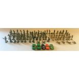 Collection of several plastic toy soldiers, including some Britains and 5 toy cars