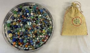 Large quantity of marbles, including embroidered bag containing marbles