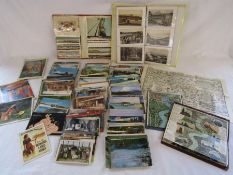 Collection of postcards some written, also Pratts oil map and 2 other maps