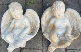 Two concrete 'Gabe' sleeping cherub Gabriels