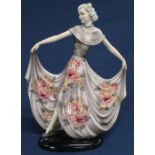 Stefan Dakon for Goldscheider Art Deco figurine of a lady holding her dress, with impressed &