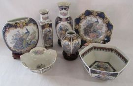 7 piece set of blue and gold Oriental ware with peacock design some with stands