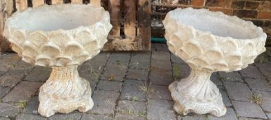 Pair of large concrete planters on bases