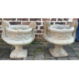 Pair of large concrete decorative two handled garden urns