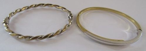 2 bi coloured 9ct gold bangles - gold twist bangle and overlap bangle - total weight 11.14g