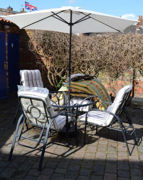 Patio table (missing glass top), 4 recliner chairs,with cushion seats, 4 spare cushion seats &