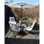 Patio table (missing glass top), 4 recliner chairs,with cushion seats, 4 spare cushion seats &