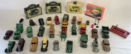 Selection of various diecast cars and 4 boxed diecast cars including John West, Swan Vestas and