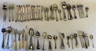 Collection of silver plate cutlery also includes two silver spoons