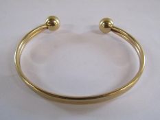 9ct gold torc bracelet stamped 375 - total weight 6.9g