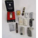 Collection of pipe cigarette lighters include Leo pipe lighter and Cohiba cigar shaped lighter