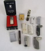 Collection of pipe cigarette lighters include Leo pipe lighter and Cohiba cigar shaped lighter