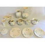 Selection of Belleek porcelain with three leaf clover design, including sugar bowl, milk jug,