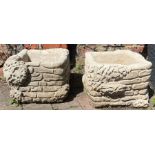 Pair of large concrete square brick planters festooned with ivy