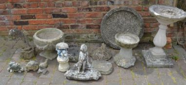 Collection of garden ornaments including bird bath