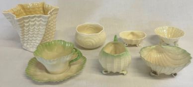 Selection of Belleek shell design, including Neptune cup, saucer, milk, jug and sugar bowl