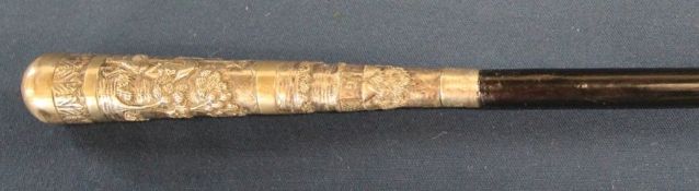 White metal (possibly Burmese silver) topped walking cane