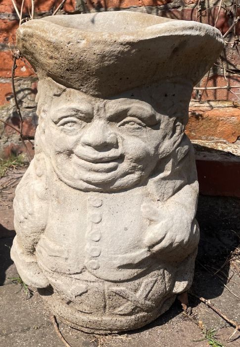 Large concrete Toby jug planter