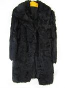 Black fur coat with belted back