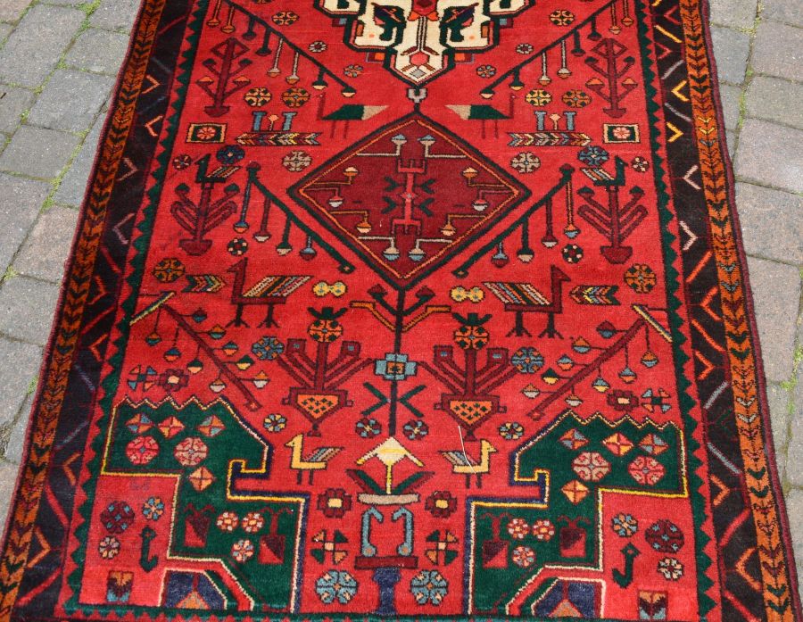 Rich red ground & emerald green full pile Persian lori carpet 310cm by 126cm - Image 2 of 3