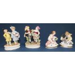 Pair of Volkstedt figurines depicting children & pair of Continental cherubs with goat / sheep (some