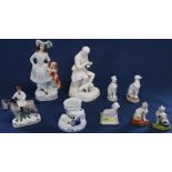 Staffordshire figurine of lady with spaniel, bisque figurine of Darwin, 19th century and later