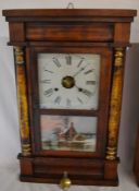 Empire Column American 19th century wall clock with 30 hour weight driven movement by Waterbury