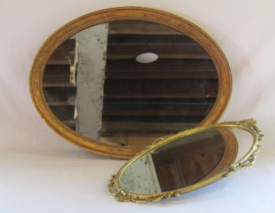 Wooden oval mirror and metal gilt framed oval mirror