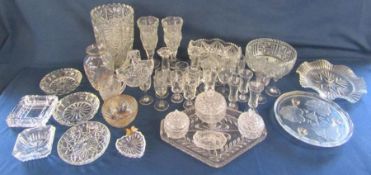 Collection of glass ware includes vase, ashtrays, dishes, plates, glasses etc