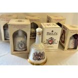 6 boxed Bells Whisky commemorative decanters, including Prince Charles and Lady Diana Spencer, Queen