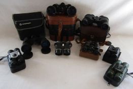 Collection of binoculars includes Praktica CN 10x25DCf - tasco 30x25DCF - unbranded 8x21 - Aquilis