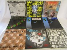 A collection of approximately 42 LP records, including GBH, State of Mind, Stiff little fingers,
