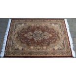 Fine woven full pile Turkish rug with all over floral medallion design 147cm by 100cm