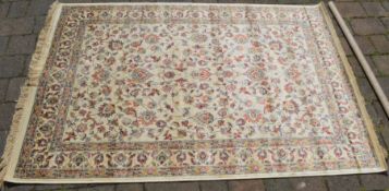 Ivory ground full pile cashmere rug with all over floral pattern 170cm by 120cm