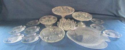 Collection of stemmed glass plates also fish platter with side plates