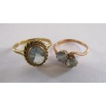 2x 9ct gold rings both with possibly aquamarine stone - single stone ring size O - double stone ring