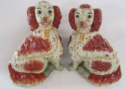 2 similar large Staffordshire style fireside spaniels - approx. 36cm - one showing firing cracks
