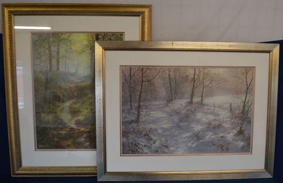 2 framed limited edition prints with indistinct signatures depicting forest scene & snow scene