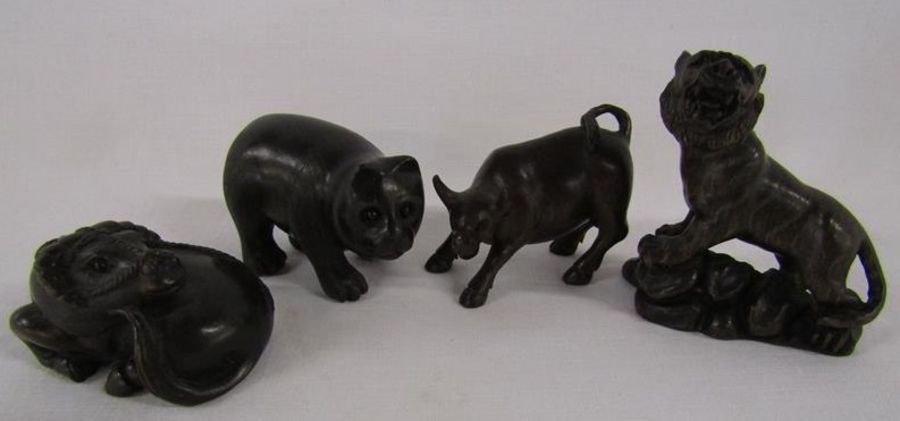 4 wooden netsuke, signed - water buffalo, bear, bull and tiger