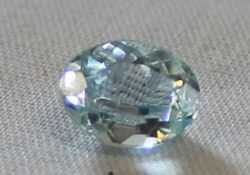 Loose cut and polished oval cut aquamarine stone 10.5mm length, 8mm wide, 5mm deep, total weight 3.