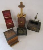 Stork cigarette dispenser, 3 wooden cigarette holders and a metal Oriental patterned box
