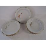 Tognana Italian porcelain dinner plates and bowls with gilt decoration